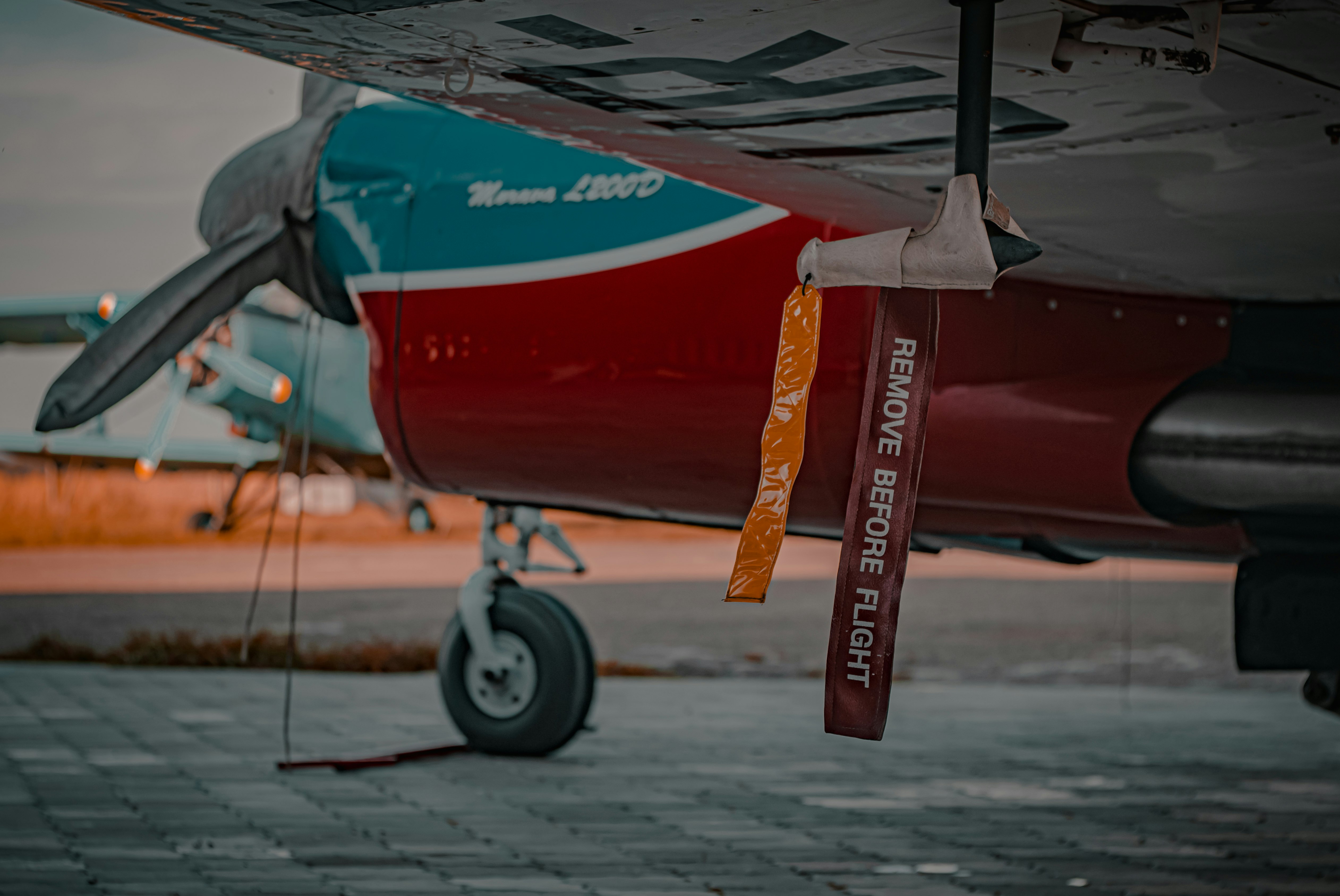 red and white plane toy